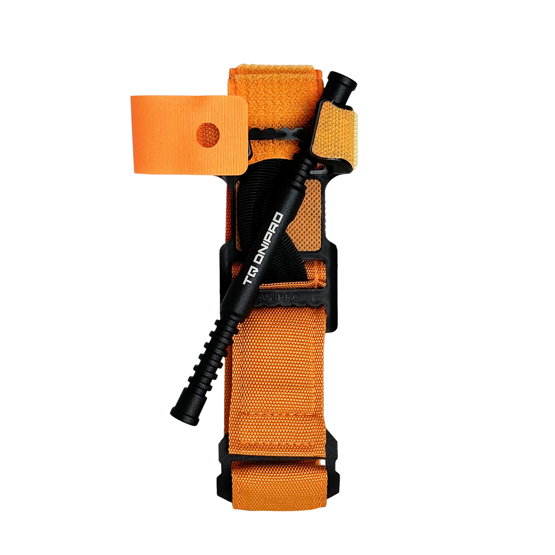 TQ DNIPRO Gen. 2 hemostatic tourniquet in high-visibility orange, detail view